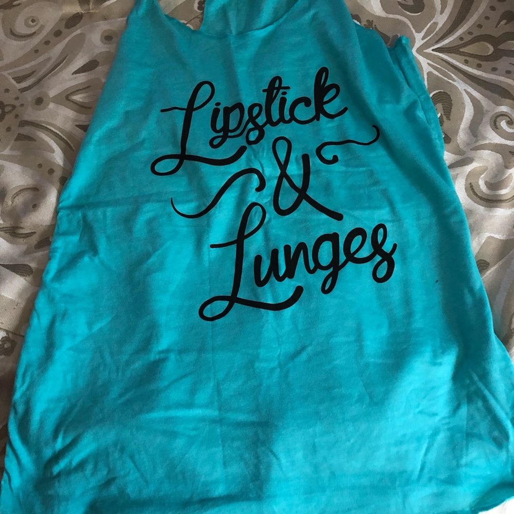 Bundle of 4 workout tanks, all different sayings